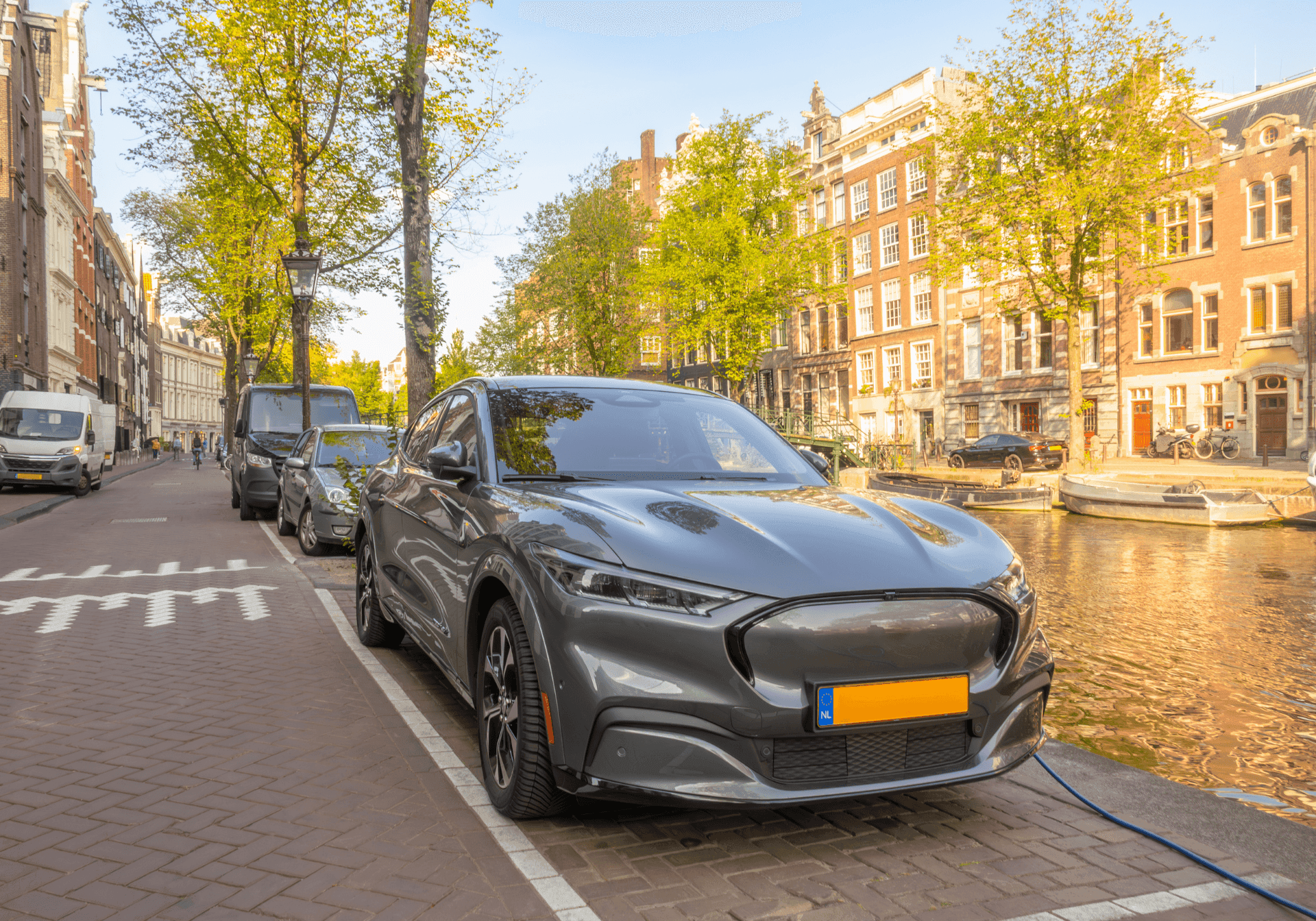 Parked car next to a canal in Amsterdam