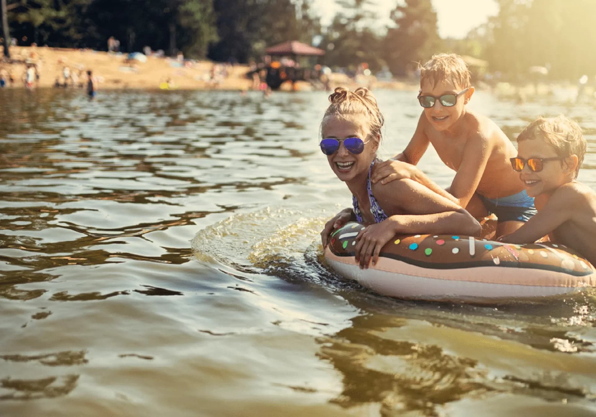 3 kids bathing at a lake in germany during summer